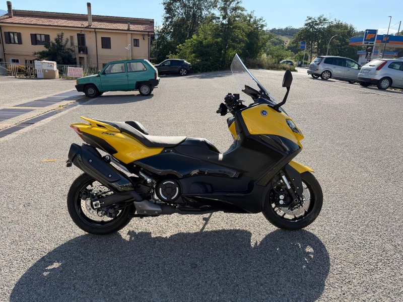 
								T-MAX 560 completo									
