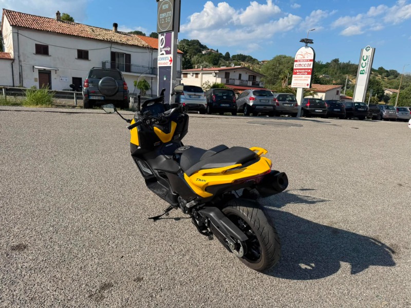 
								T-MAX 560 completo									
